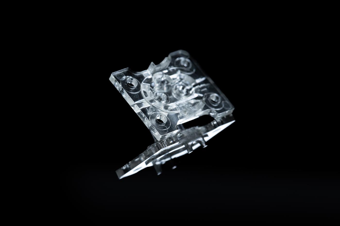 PHOTO D'UNE PIÈCE RÉALISÉE AVEC UN MOULE À INJECTION PLASTIQUE