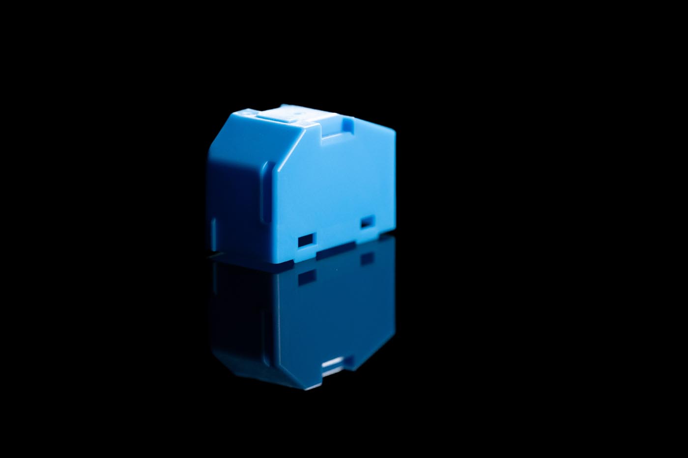 PHOTO D'UNE PIÈCE RÉALISÉE AVEC UN MOULE À INJECTION PLASTIQUE