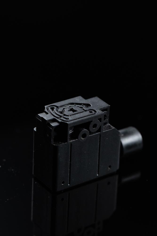 PHOTO D'UNE PIÈCE RÉALISÉE AVEC UN MOULE À INJECTION PLASTIQUE